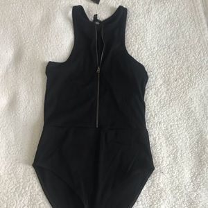 Express zip-up bodysuit black with gold zipper.